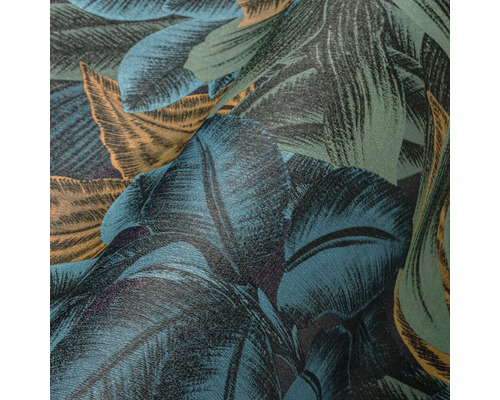 Close-up van een stof met een bladmotief