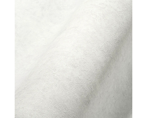 Close-up van een wit structuurbehang.