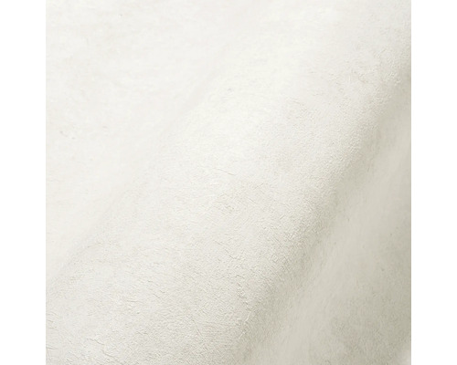 Close-up van een wit structuurbehang.