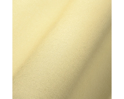 Close-up van een lichtgekleurd behang met fijne structuur