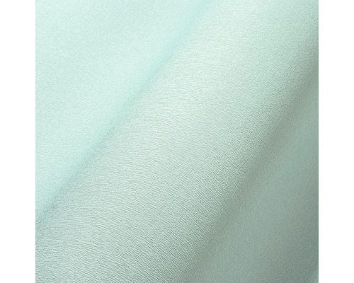 Close-up van een licht vliesbehang met een lichte structuur