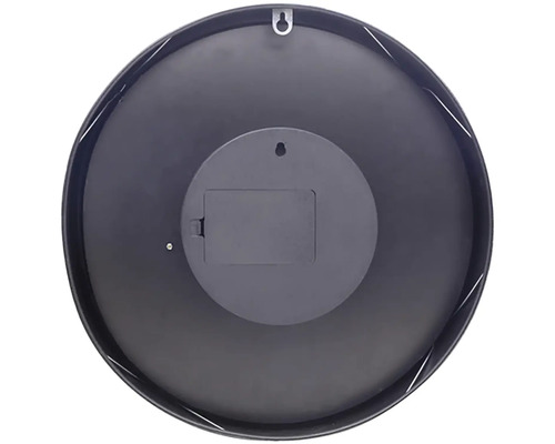 Achterkant van een ronde wandklok met batterijcompartiment en ophangmechanisme