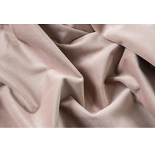 Close-up van beige velours stof in plooien