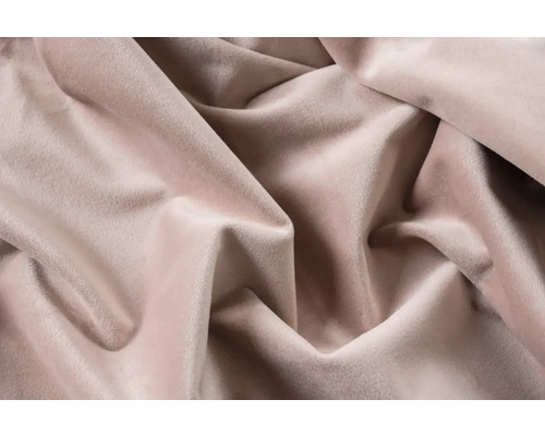 Close-up van beige velours stof in plooien