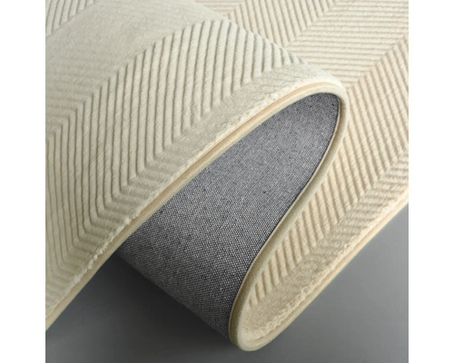 Detailopname van een tapijt met zigzagpatroon