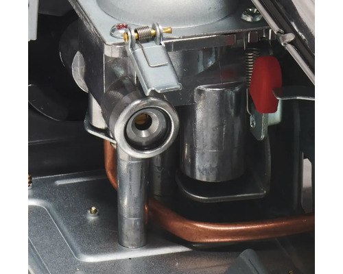 Detailopname van een brander met metalen elementen en koperen buis