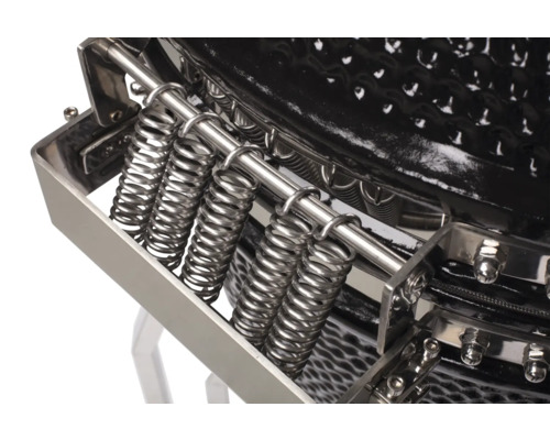 Detailopname van veren van een grillapparaat.