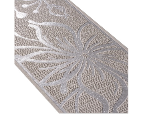 Detailopname van een sierrand met bloemmotief