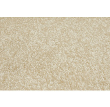 Close-up van een beige tapijt.