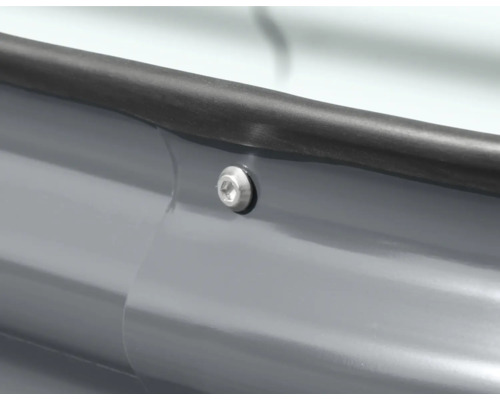 Detailweergave van een schroef op een grijs onderdeel met rubberen afdichting