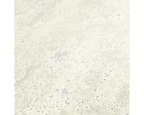 Close-up van een lichtgekleurd behang met textuur