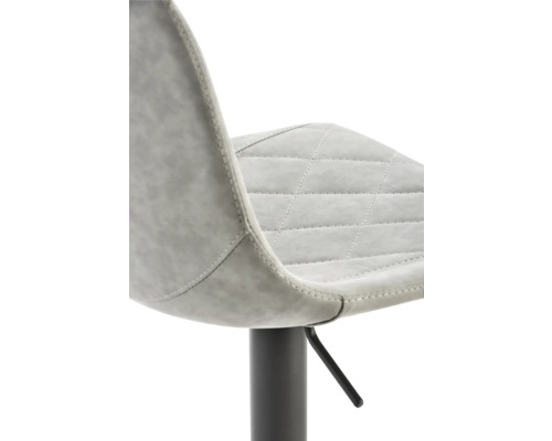 Detailopname van een barkruk met stiksels