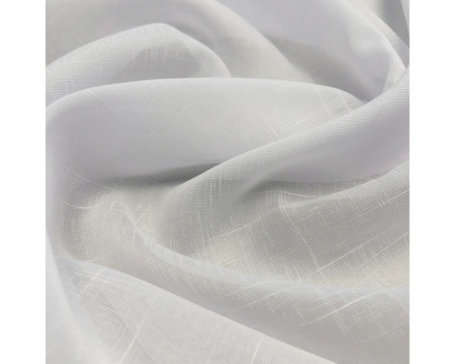 Detailopname van witte, lichtdoorlatende gordijnstof