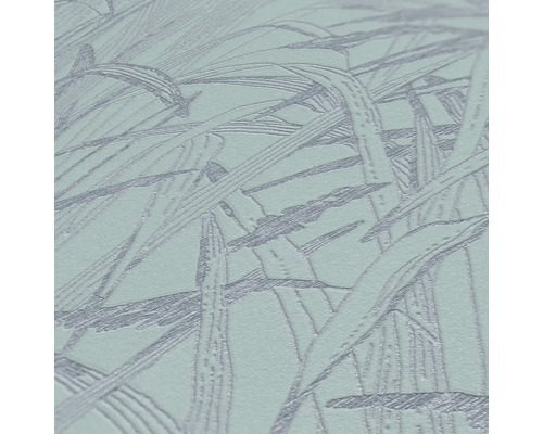 Close-up van behang met een grasmotief.