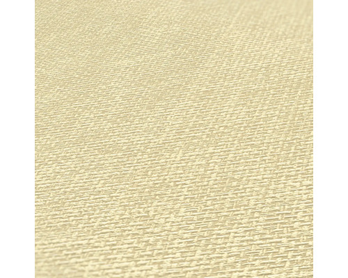 Close-up van een beige vinylbehang met textielmotief.