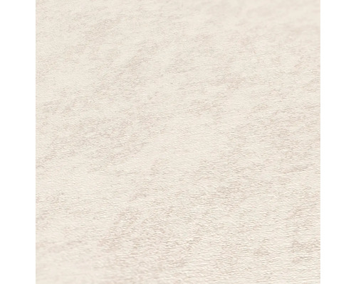 Close-up van een lichtgekleurd behang met fijne structuur