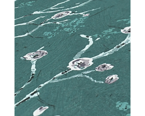 Close-up van een gestructureerd behang met bloemmotief