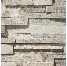 Close-up van een muur met behang in steenmotief