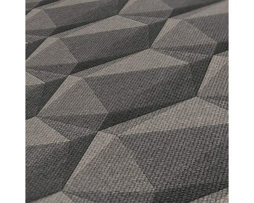 Close-up van een structuurbehang met een driedimensionaal geometrisch patroon