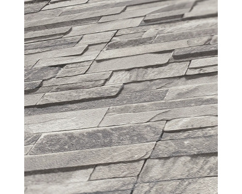 Grijs behang met steeneffect