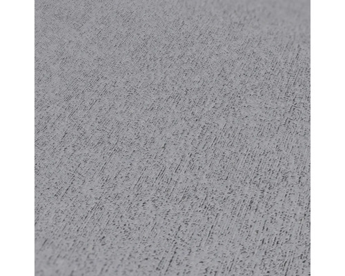 Close-up van een grijs structuurbehang.