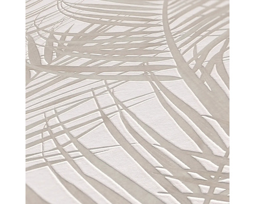 Close-up van een gestructureerd behang met palmenbladmotief