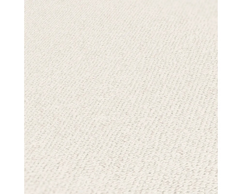 Close-up van een lichtgekleurd tapijt met textuur