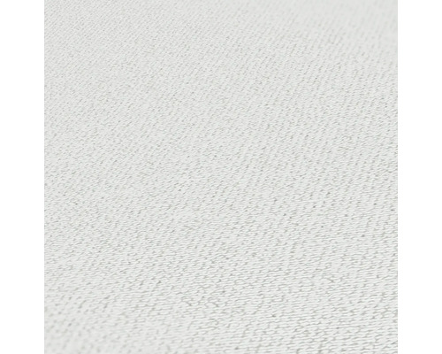 Close-up van een gestructureerde, lichte textielstof