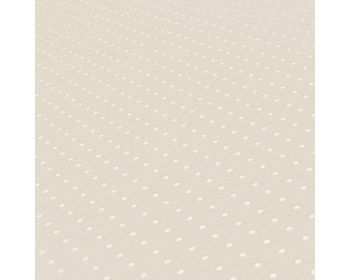 Close-up van een bekleed behang met stippenpatroon.