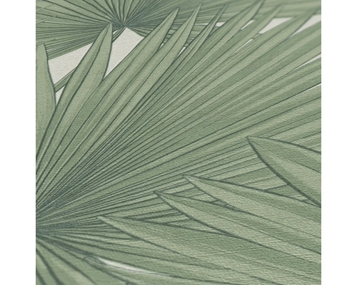 Close-up van een behang met een palmenbladmotief