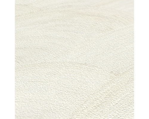 Close-up van lichtgekleurd vinylbehang met subtiele textuur