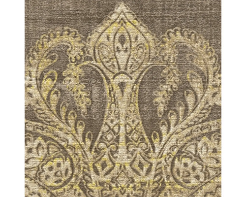 Detail van een gestructureerd behang met oosters motief