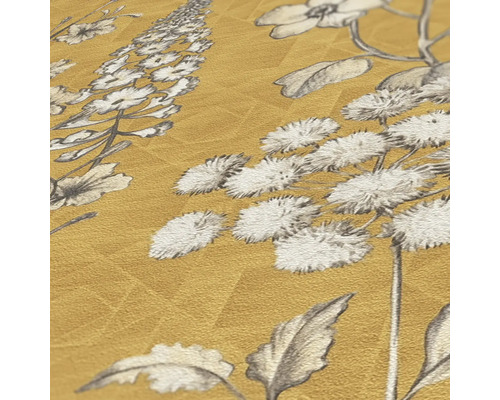 Detailweergave van een goudkleurig behang met bloemmotief