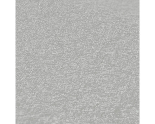 Close-up van een lichte pleisterstructuur.