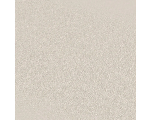 Close-up van een beige vinylbehang met fijne structuur