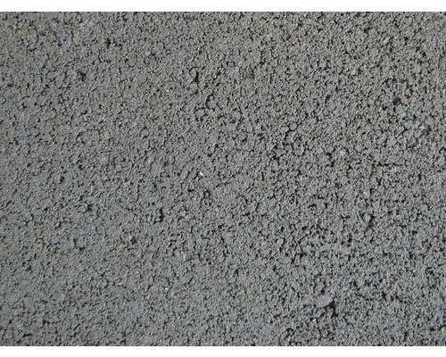 Close-up van een betonsteenmateriaal met ruwe textuur