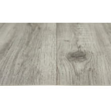 Close-up van twee grijze vinylvloerpanelen met houtnerf