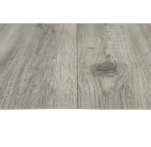 Close-up van een grijze vinylvloer met houtlook.