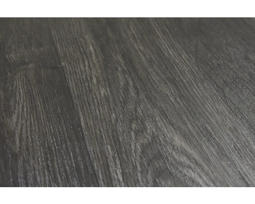 Close-up van een donkere vinylvloer met houtlook