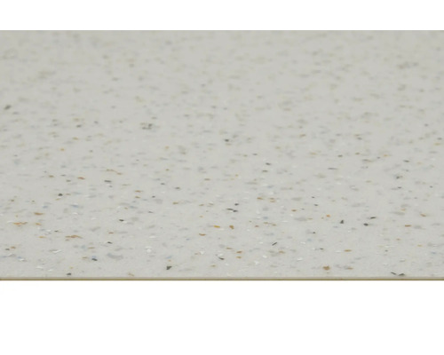 Close-up van een lichtgekleurd werkblad met spikkelpatroon