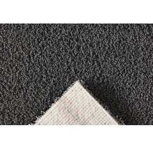 Detailopname van een grijs tapijt met pool en textielrug