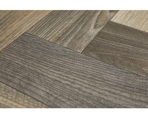 Close-up van vinyl vloer in visgraatmotief