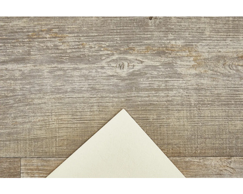 Decoratieve plaat met houten structuur en een lichte papieren hoek