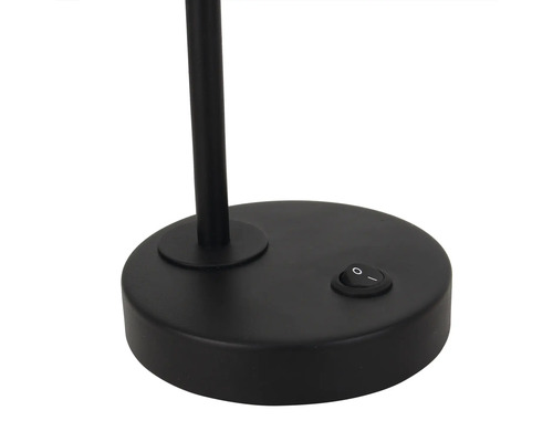 Detailopname van de voet van een lamp met schakelaar