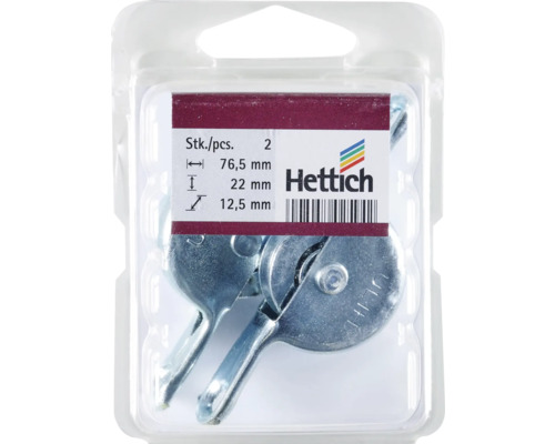Verpakking met twee metalen meubelbeslagstukken met afmetingen 76,5 mm, 22 mm en 12,5 mm van Hettich