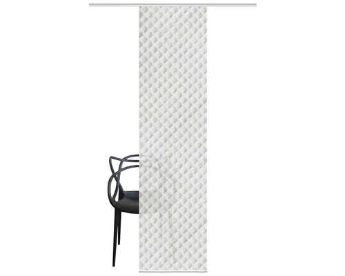 Decoratief schuifgordijn met wafelstructuur naast een stoel