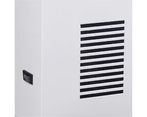 Detailweergave van een ventilatierooster en een schakelaar.