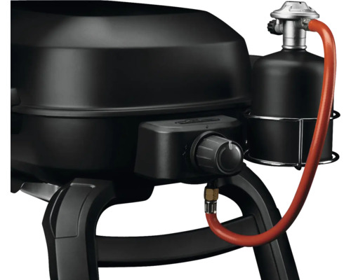 Detailopname van een zwarte gasbarbecue met regelaar en gasfles