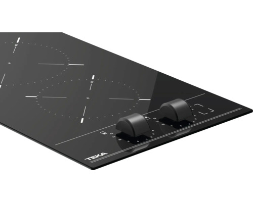 Zwarte Teka keramische kookplaat met draaiknoppen