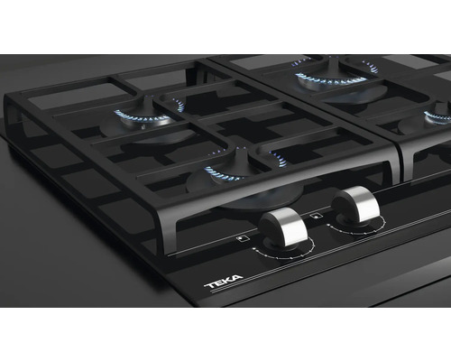 Zwarte Teka gaskookplaat met vier branders en zilverkleurige knoppen